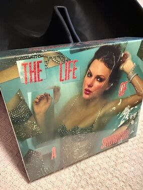 Unopened Taylor Swift Life of a Showgirl CD and keychain